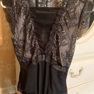 2/20 Lacey body suit